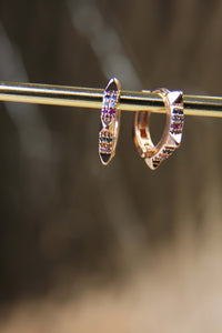 aros multicolor con pinchos dorados