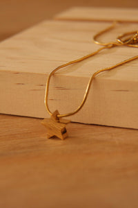 cordón estrella dorado